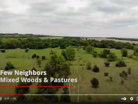 open pastures and wooded too