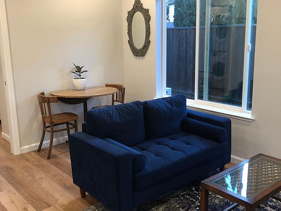 Dining area and living area adjacent to the kitchen.