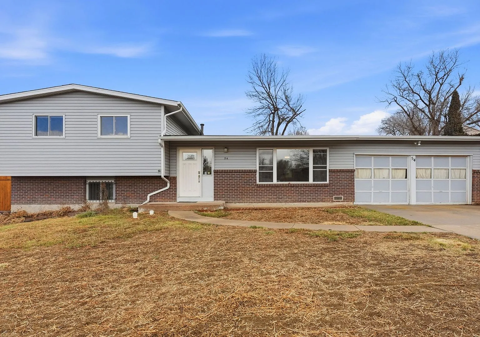 Updated 4BR Home with 2-Car Garage in Stratmoor — Photo 2