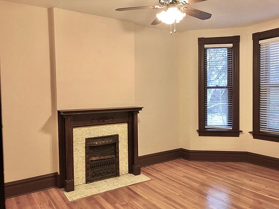Living Room with Fireplace and Bay Windows