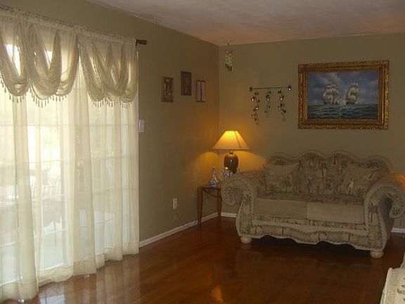 Patio door at Living Room leading to backyard