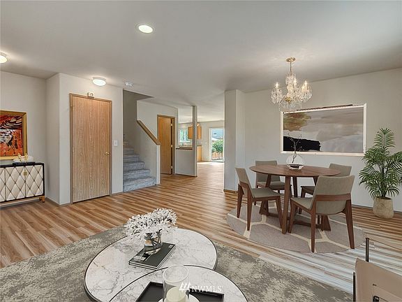 Large spaces from front entrance leading to the ktichen and the backyard and patio