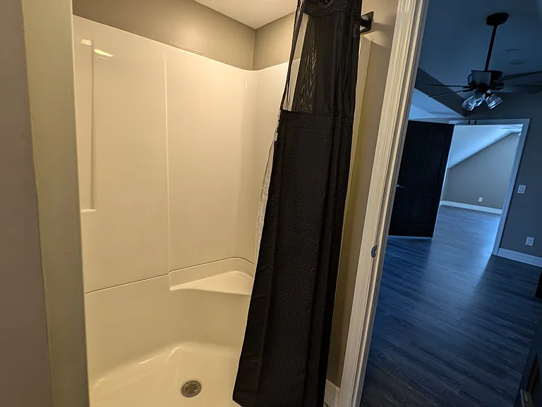 Oversized shower with seat