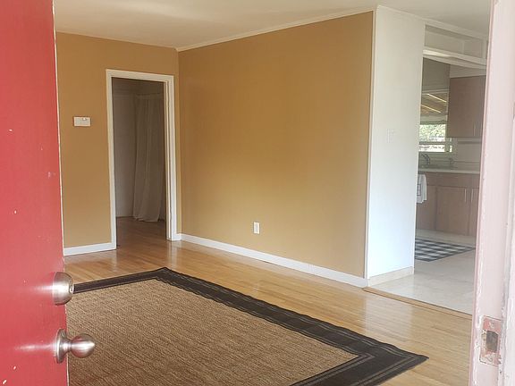 The walls are freshly painted white