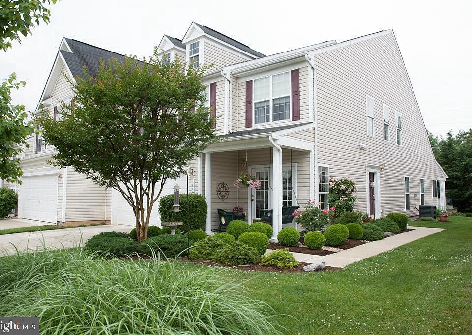 Cozy front porch. This home offers 2960 sq. ft