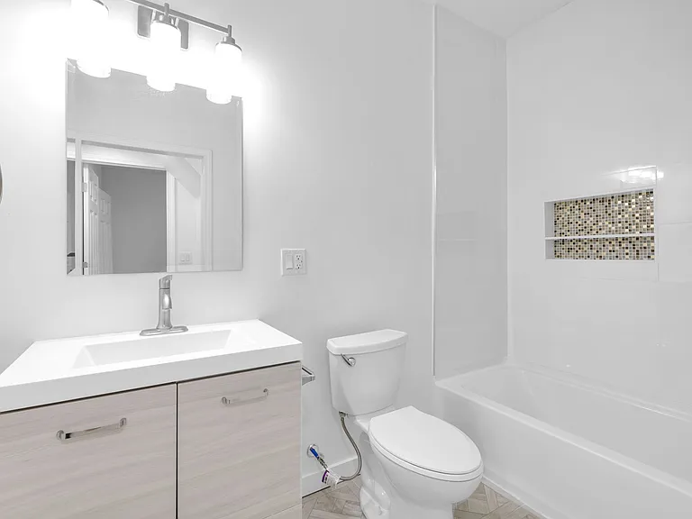 Ensuite bathroom for the main floor primary bedrooom