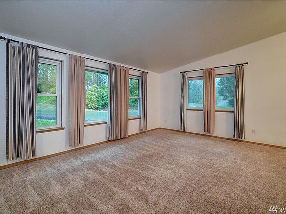 Large picture windows bring the outdoors in.