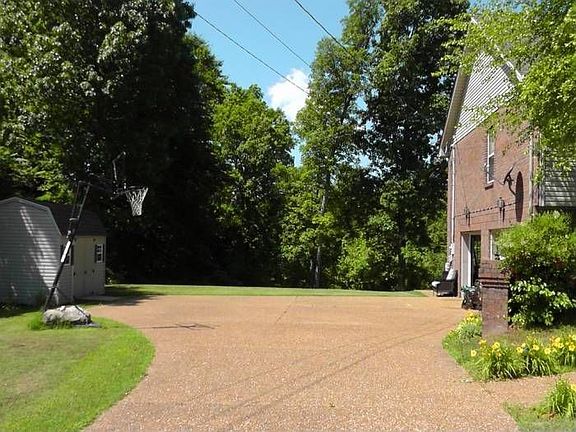 Large driveway & backyard