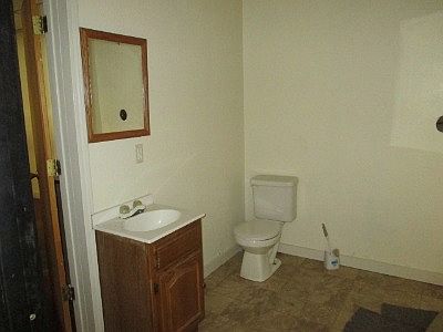 ONE OF THE TWO BATHROOMS