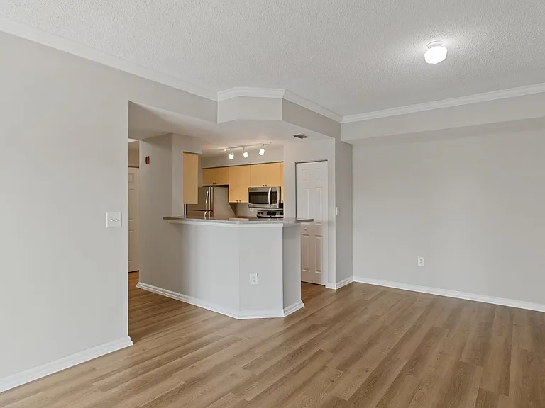 Partial finish kitchen view with stainless appliances