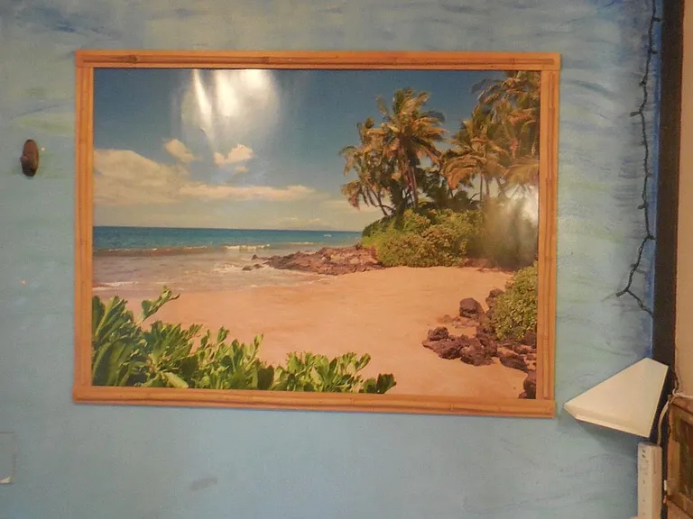 Local Beach Artwork, Power strip & small shelf to charge your USB items.