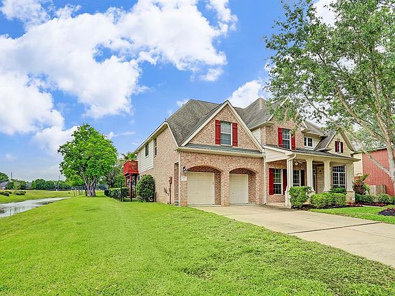 Greenbelt on the side of the home provides privacy.