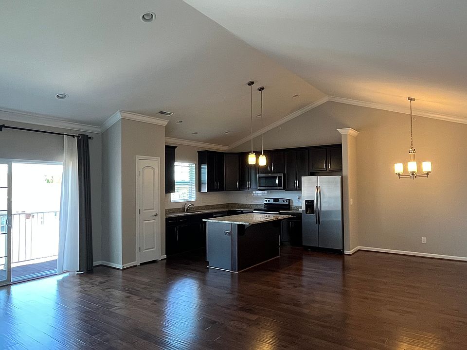 Kitchen, dining area and balcony