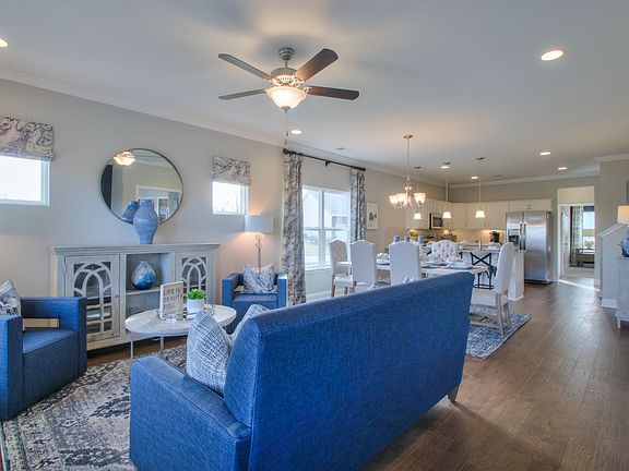 The Baymont Living Dining Kitchen This is a model representation, not the actual home