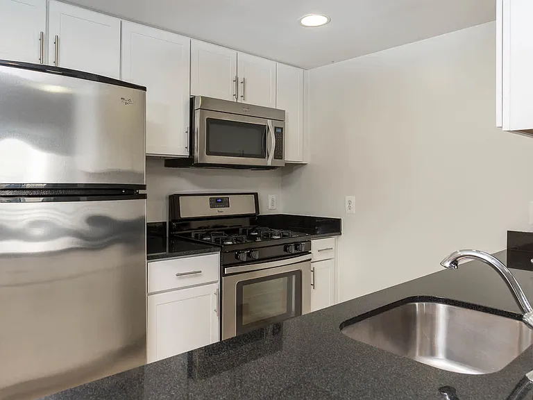 Kitchen with Granite Countertops and Stainless Steel Appliances
