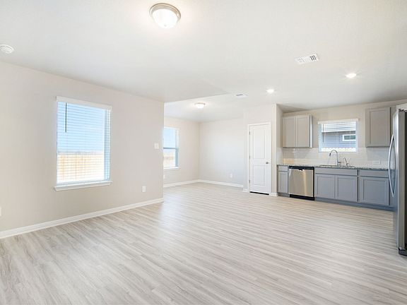 Kitchen, Living Room, and Dining Room