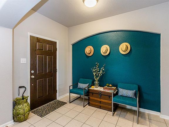 As you step in, a beautiful accent niche greets you.