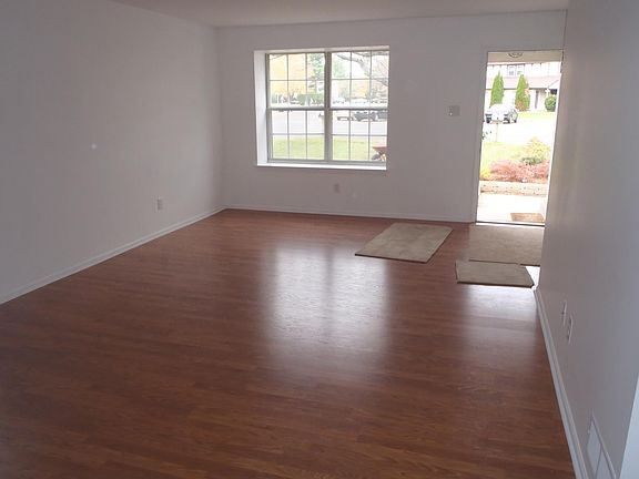 View of living room and attached dining room.
