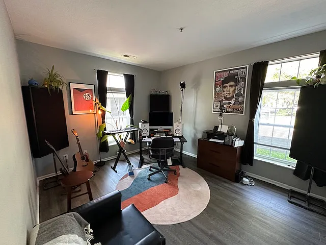 Spacious bedroom can be used as an office.