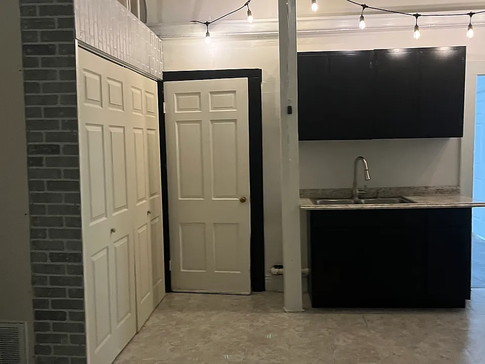 Spacious kitchen with moveable island. Gas range and new butcher block beside making cooking easier!