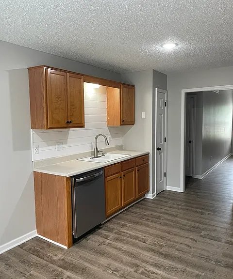 Kitchen includes a closeted pantry providing extra storage