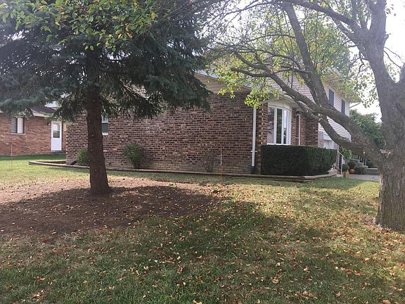 Side yard with mature trees