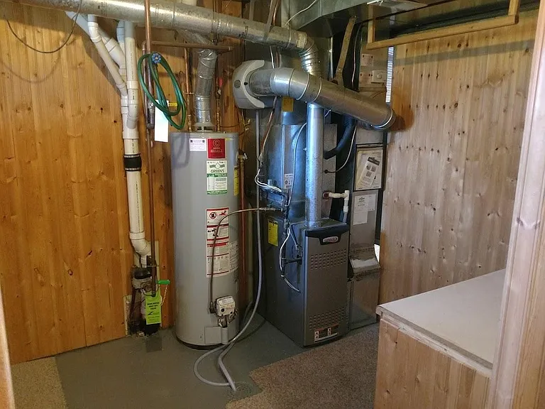 View of water heater, furnace, humidifier