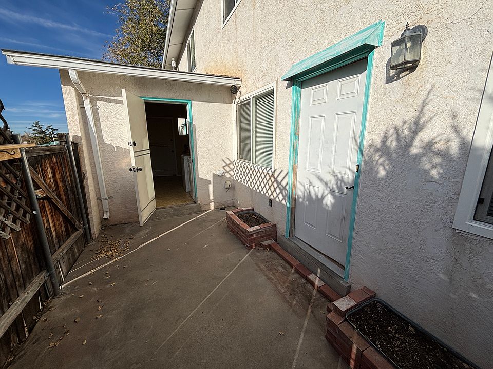 Entry Courtyard (open door leads to laundry area)