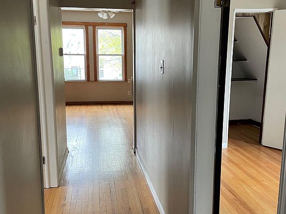 Hallway - doors to bedrooms on the right and left and looking toward the living room