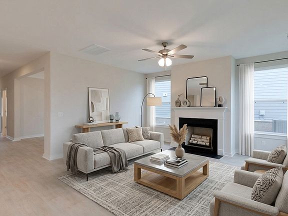 Dedicated Living Room space with plenty of natural light and room for cozy furniture