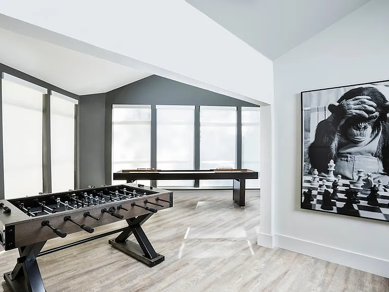 Resident game room with shuffleboard and foosball