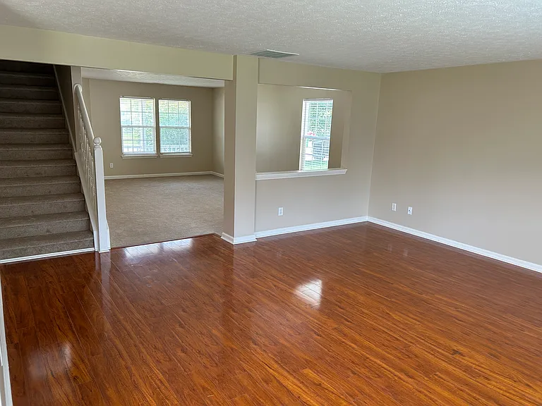 Open floorplan with dining area and family room