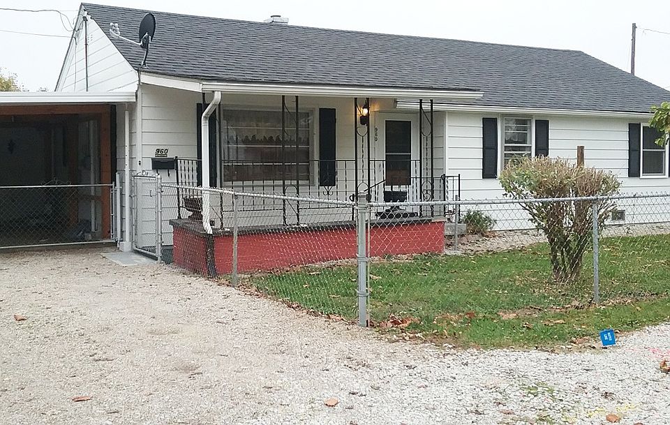 large carport and storage garage