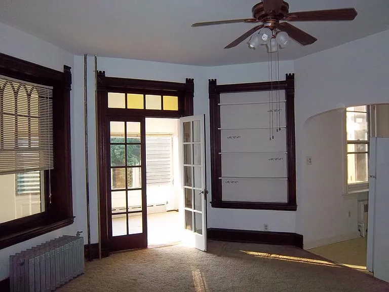 Living room to front bedroom