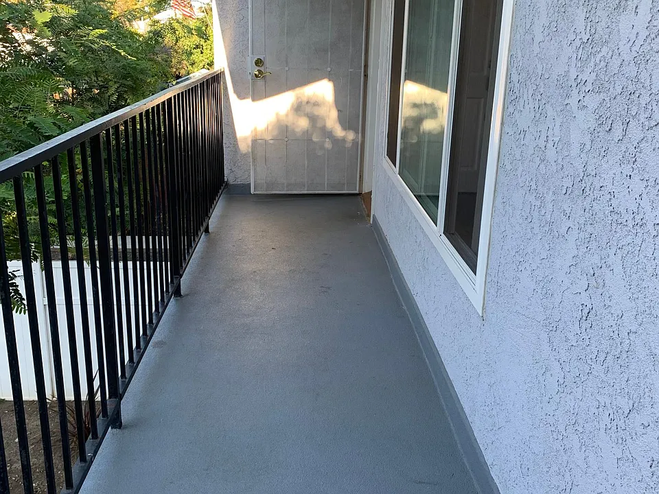 balcony overlooking the private yard.