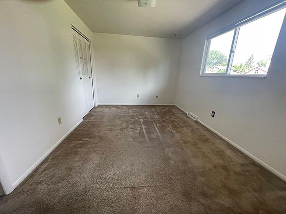 Master bedroom with private access to bathroom.