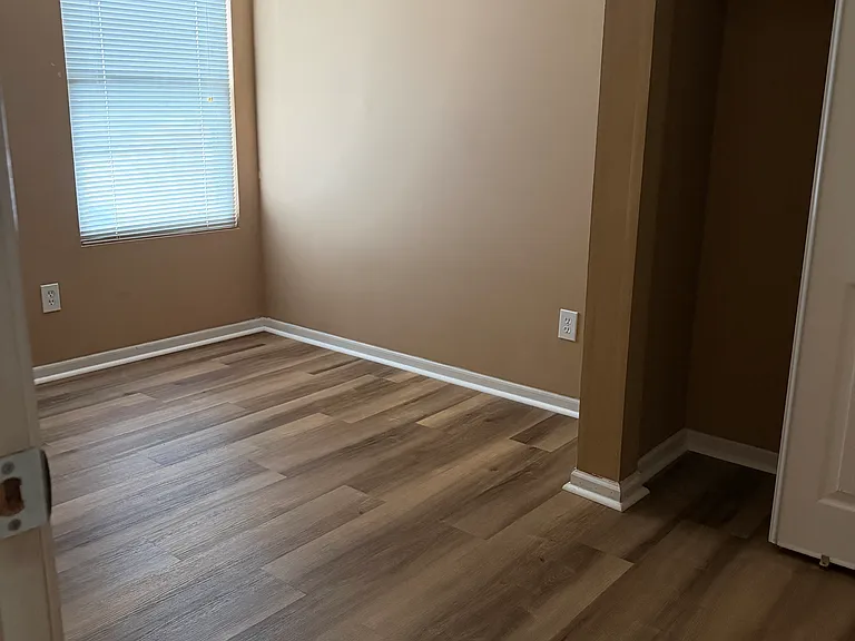 3rd bedroom with wood floor