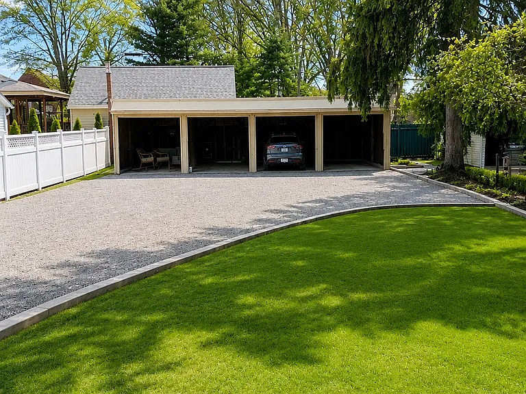 Garages, driveway and and green space