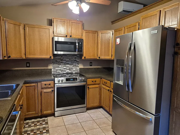 Kitchen with updated stainless steel appliances