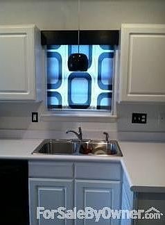 Kitchen Sink
						:
						Custom blinds/window valances in Kitchen/Dining Area, LR and all bedrooms