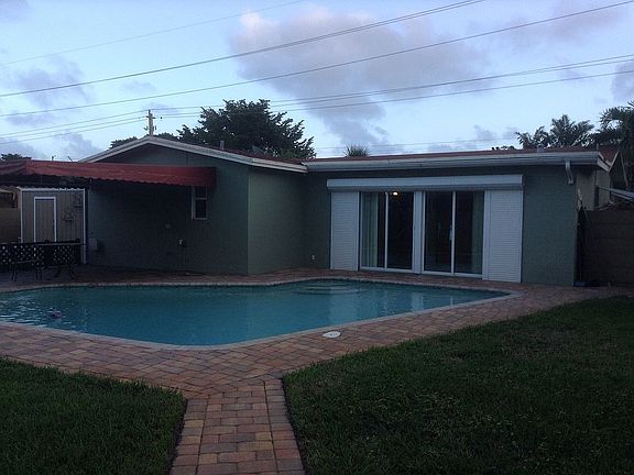 Pool surrounded by pavers