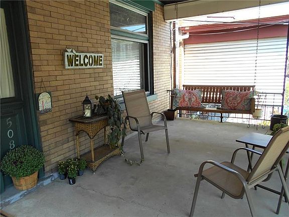We're serious about you feeling WELCOME here. Get cozy and enjoy the outdoors on your front porch.