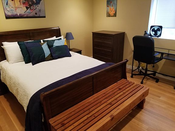 queen size bed and desk