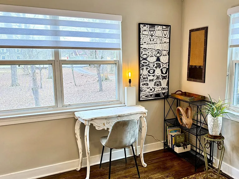 Bedroom #3, writing desk where you can gaze out at nature in the sweeping front yard