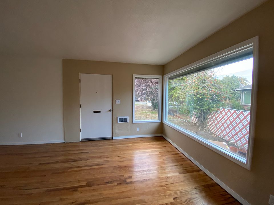 Living Room wth new hardwood floors and fresh paint