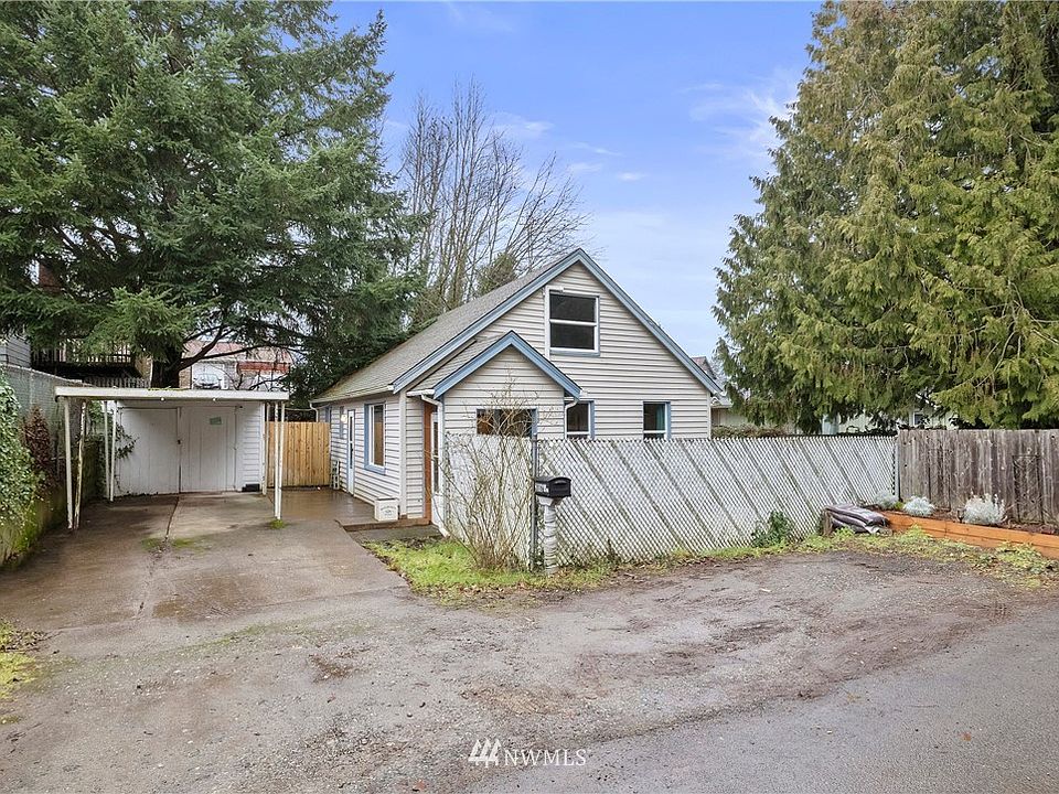 Nestled amongst beautiful trees, this cozy cottage would make a perfect new  home for you