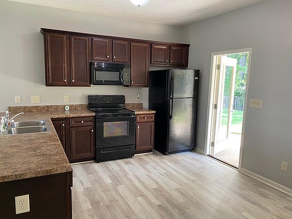 Large kitchen with wrap-around counter