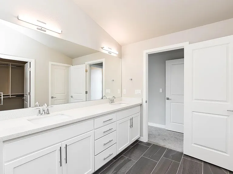 Master bedroom bathroom with dual vanity