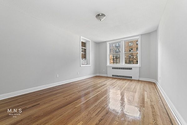 1st image of 415 E 17th St APT 1M