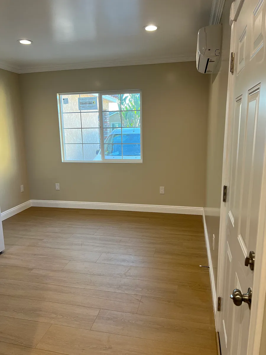 Building Photo - 8248 Elmont Ave #1/2